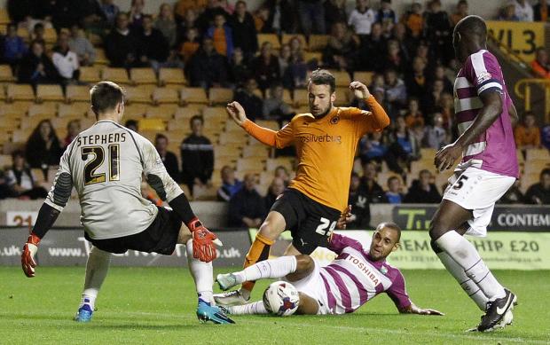 Jamie Stephens in action for Barnet vs Wolves - source http://www.newsshopper.co.uk/